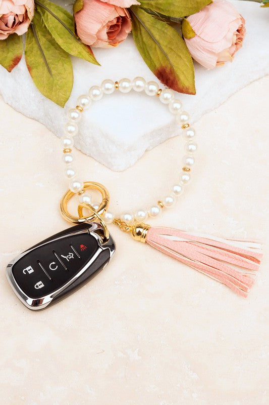 Classic Pearl Key Ring Bracelet with light pink faux leather tassel