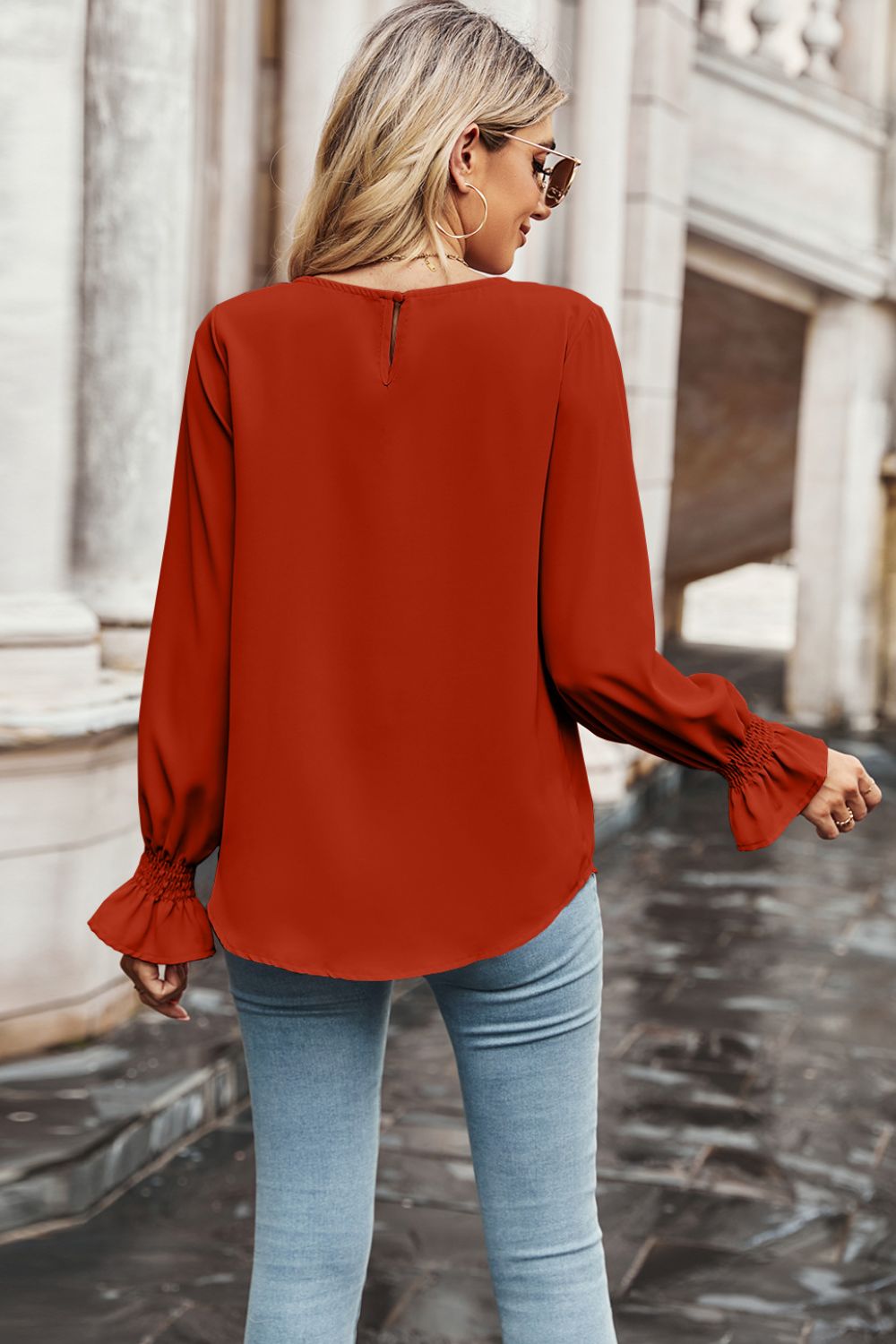 Women's Red-Orange Colored Round Neck Long Flounce Sleeve Blouse with Smocked Wrists, Rounded Hem Line in Front and Back