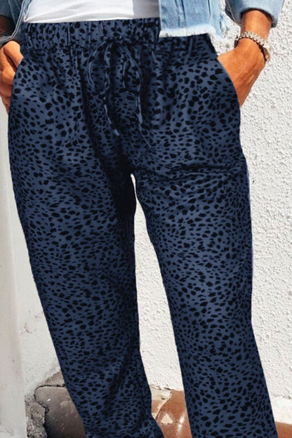 Close up of Women's Navy Blue and Black Leopard Print Jogger Pants with Pockets