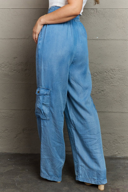 back view of soft denim cargo pants, wide leg, elastic waistband