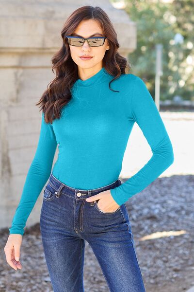 sky blue bodysuit paired with jeans